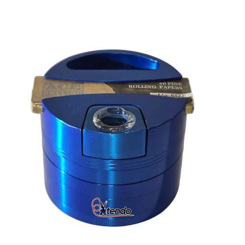 Blue metal grinder with rolling papers