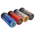 Set of four cylindrical containers with colorful designs on a white background
